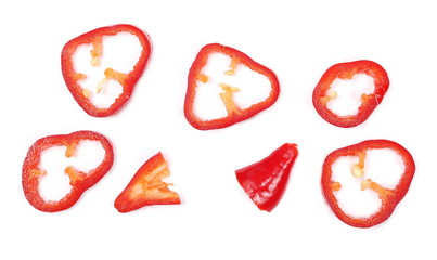 Fresh red pepper slices isolated on white background, top view