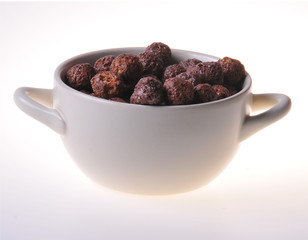 Crisp breakfast with milk. Healthy food. Close-up