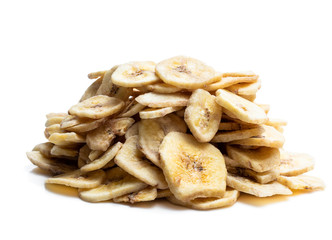 Homemade dehydrated banana chips isolated on white