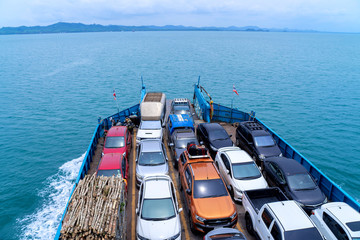 Obraz na płótnie Canvas Ferries carry cars to the Koh Chang island at Trad province Eastern of Thailand on April 2019 , island of Thailand landscape