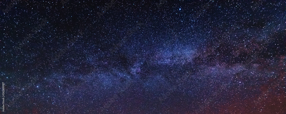 Wall mural fantastic starry sky with galaxy milky way over mountainous masses of ukrainian carpathians