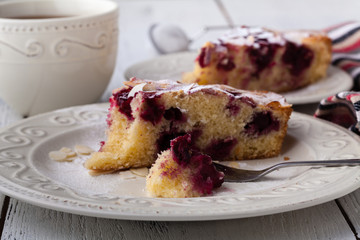 Breakfast concept, Homemade slice of shortbread dough raspberry pie with almond petals