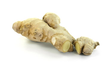 Fresh ginger on white background, herb medical concept - Image. Raw ginger root . Raw ginger root isolate on white background. Ginger root originated as ground flora of tropical lowland forests.