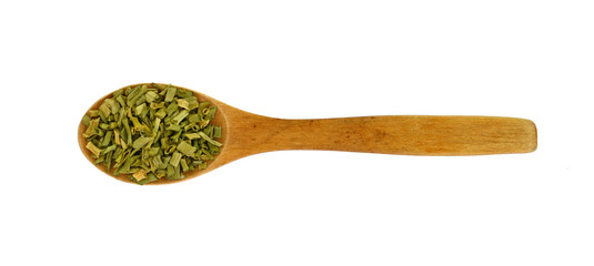 Pile of dried oregano isolated on white. Pile of dried oregano leaves on a white background. Spice for pizza. Pizza ingredient.