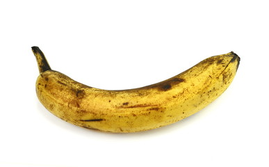Overripe banana isolated on white background.