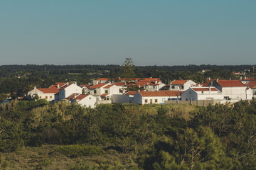 Almograve village seen from the dunes on the beach seen from the dunes on the beach