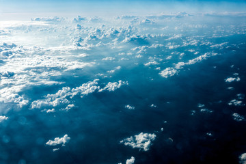 Plakat Top view of white clouds above the ground or water