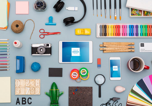 Smartphone and Tablet Surrounded by Art Supplies Mockup