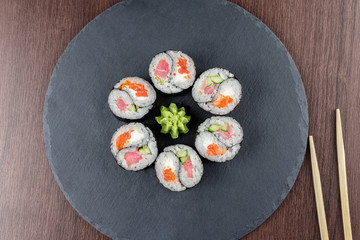 Rolls Yin Yang top view on the slate Board