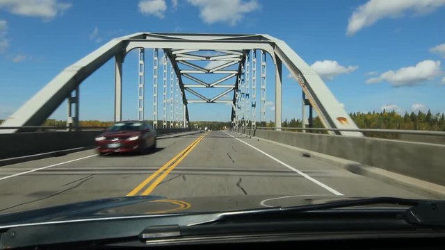 Driving over White Lake Narrows Bridge on Highway ON-17. Between White River and Marathon, Ontario. White Lake Provincial Park, Ontario, Canada.