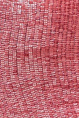 Fabric with sequins and sequins of bright colors. Fashion glitter fabric, sequins. Shiny surface