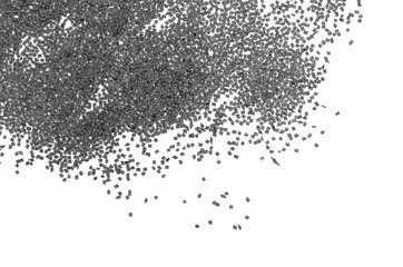 Gunpowder for a military or hunting rifle. Pile gunpowder, black powder isolated on white background.