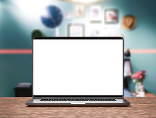 Laptop with blank screen, dark aluminium body. Laptop in focus.