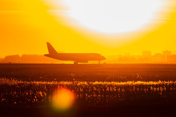 sunset plane on the runway