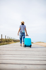 Fototapeta premium young woman traveling around the world