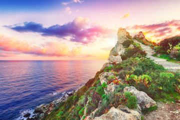 Dramatic spring sunrise on the the cape Milazzo panorama of nature reserve Piscina di Vener