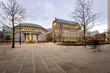 St Peter Square with library, town hall and war memorial in Manchester city center.