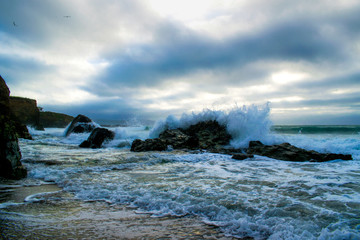 waves breaking on the rocks