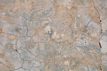 Gray concrete textures background. Cracks. Scratches. Damage. Cracked stone wall background
