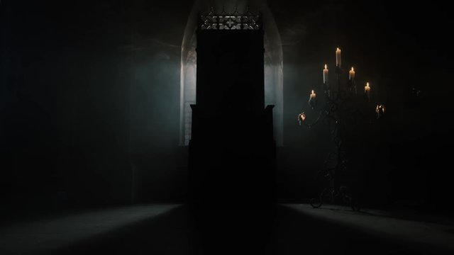 The throne of the king is in a dark room waiting for his master to plunge into the game of thrones