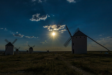 Few windmills in Campo de Criptana at sunset , Ciudad Real