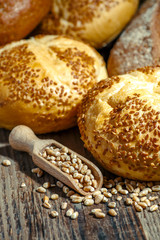 loaf of bread on wooden background, food closeup.Fresh homemade bread.French bread. Bread at leaven. Unleavened bread.Ciabatta bread.
