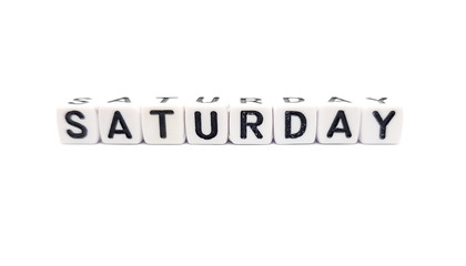 saturday word built with white cubes and black letters on white background