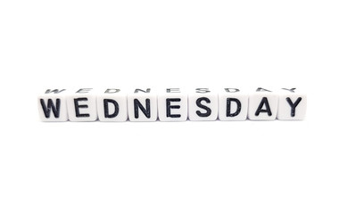 wednesday word built with white cubes and black letters on white background