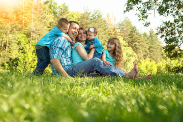 Fototapeta premium happy family playing in nature