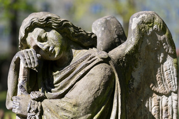 Fototapeta na wymiar The Angel from the mystery old Prague Cemetery, Czech Republic