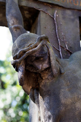 Historic Jesus on the mystery old Prague Cemetery, Czech Republic