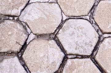 hexagon shaped tile paved sidewalk. background, urban.