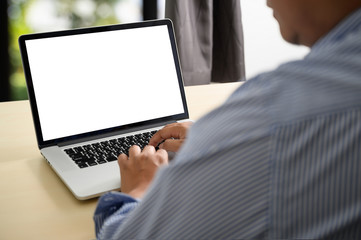 man working on his laptop with blank copy space Laptop with blank screen Mock up Blank screen...