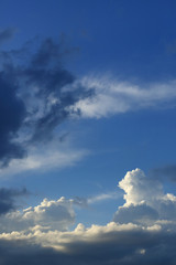 Naklejka na ściany i meble sunlight through cloud on dramatic sky background