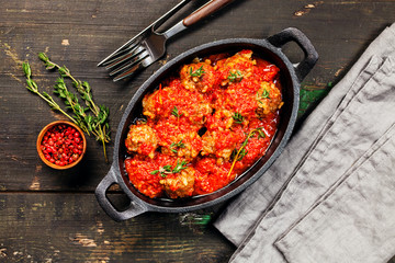 Meatballs with rise in tomato sauce