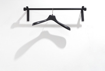  black plastic hanger on the rack