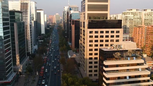 Aerial Drone shot flying between buildings in Downtown Santiago, Chile