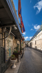 Ancient narrow street  in old city of Jerusalem that  is considered holy to the three major religions — Judaism, Christianity, and Islam, Israel