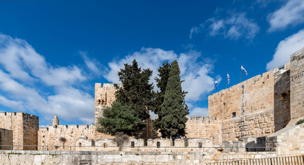 Fototapeta na wymiar Ancient fortified wall in old Jerusalem holy city, Israel