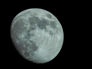 almost full moon in the night sky