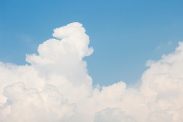 Bright blue sky with white clouds for background or wallpapers