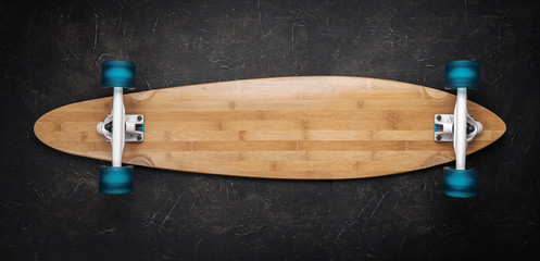 Wooden longborod with blue wheels on a black background.