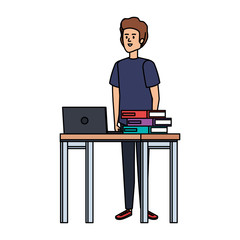 young teacher in desk with laptop and books