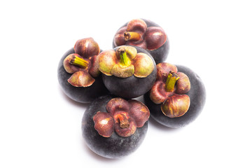 Group of mangosteen isolated on white background. Mangosteen is a queen of fruit in Thailand and asia fruit have a sweet. Fresh dark mangosteen background. Mangosteen is a popular fruit in Thailand.