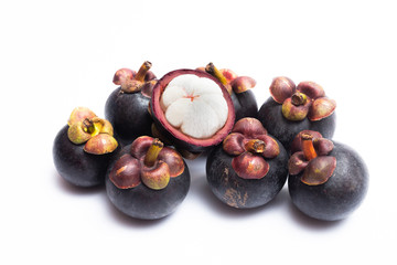 Mangosteen whole and half cut isolated on white background. Mangosteen is a queen of fruit in Thailand and asia fruit have a sweet. Mangosteen background. Mangosteen is a popular fruit in Thailand.