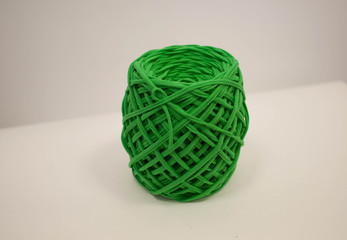 Green ball of textiles. Creativity needlework.