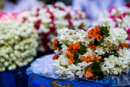 Garlands of Jasmine flowers  kept at a florist shop at Dadar, Mumbai. These garlands are used as hairdress, decorations during weddings and as offering to the temple deity 