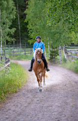 Woman horseback riding