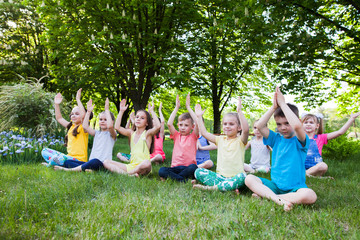 children practicing yoga.