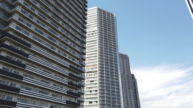 TOKYO, JAPAN. 2019 April 15th. Looking up the Shinonome Cityscape